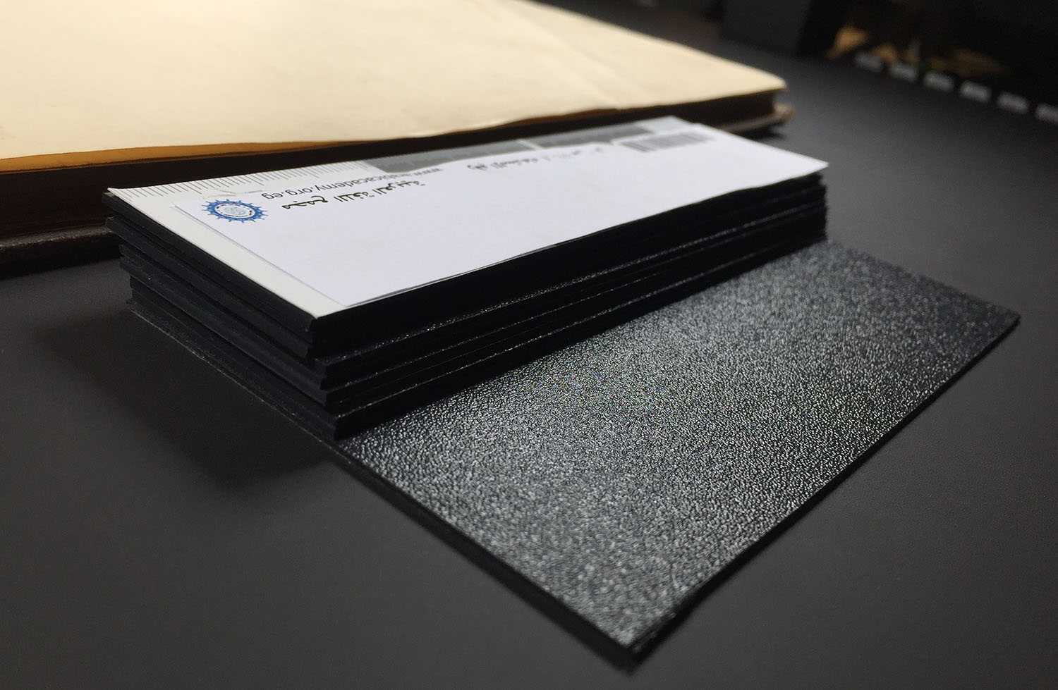 Stack of rubber mat support for gray card